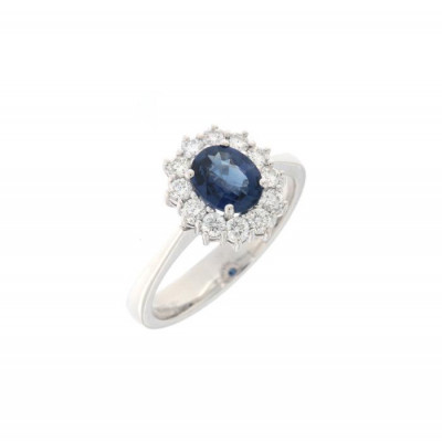 Anello classico in oro bianco con zaffiro e diamanti